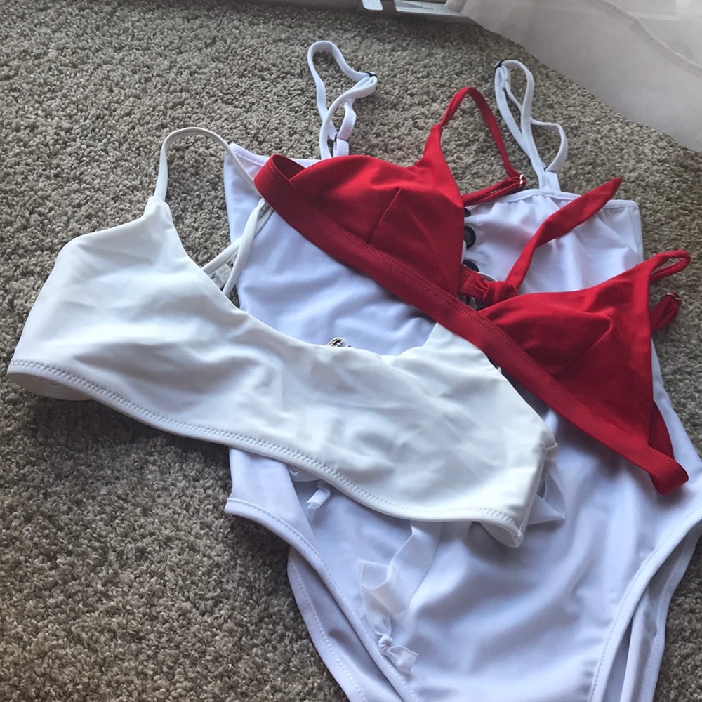 Two Swim Tops and One Onepiece